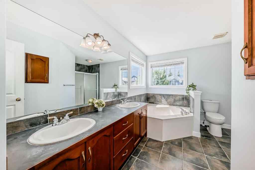 MLS® A2245748 - 77 Eversyde Close SW in Evergreen Calgary, Residential