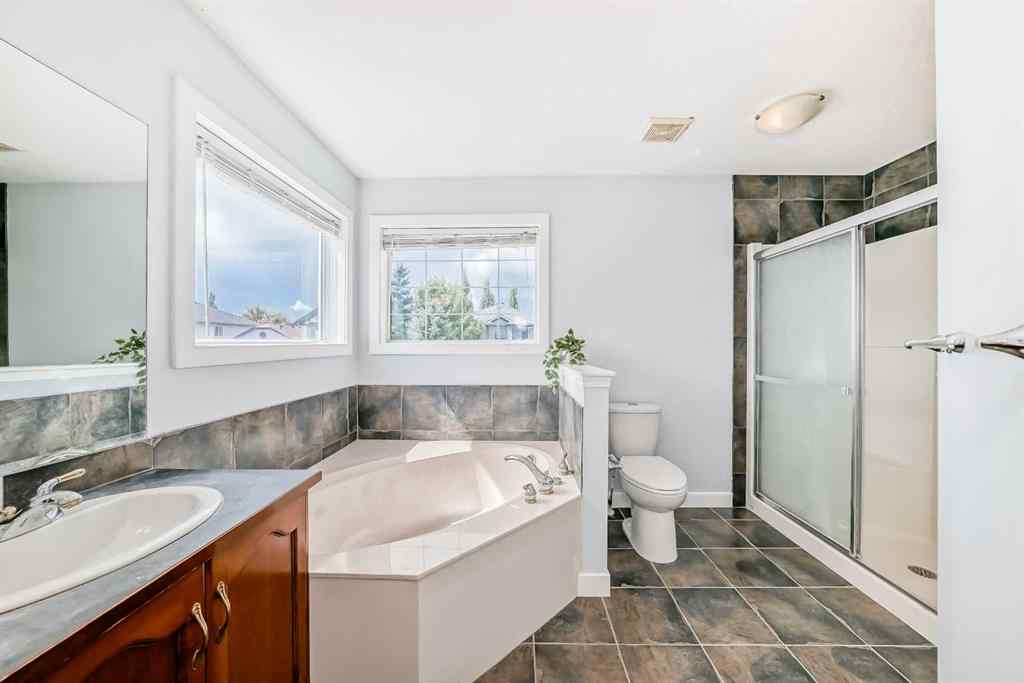 MLS® A2245748 - 77 Eversyde Close SW in Evergreen Calgary, Residential