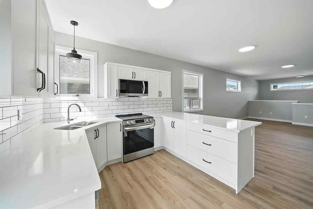 MLS® A2245777 - 84 Reynolds Road  in Ryders Ridge Sylvan Lake, Residential