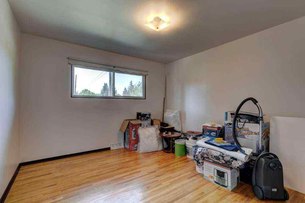 MLS® A2245841 - 1008 89 Avenue SW in Haysboro Calgary, Residential