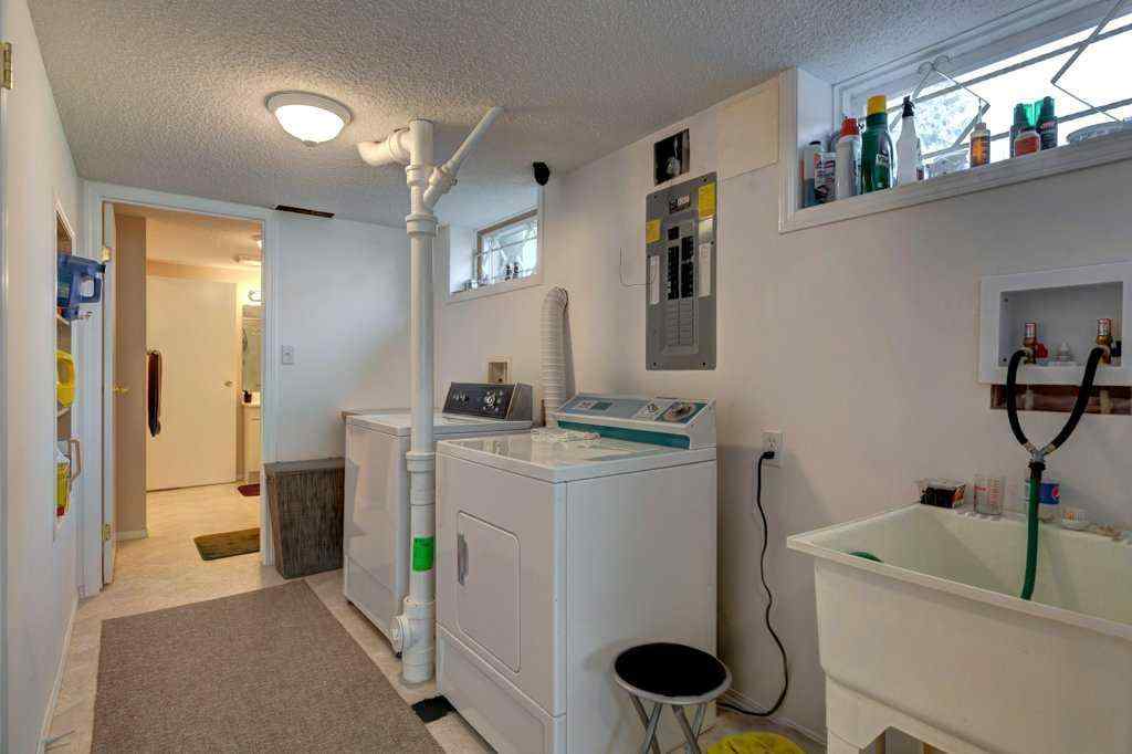 MLS® A2245841 - 1008 89 Avenue SW in Haysboro Calgary, Residential