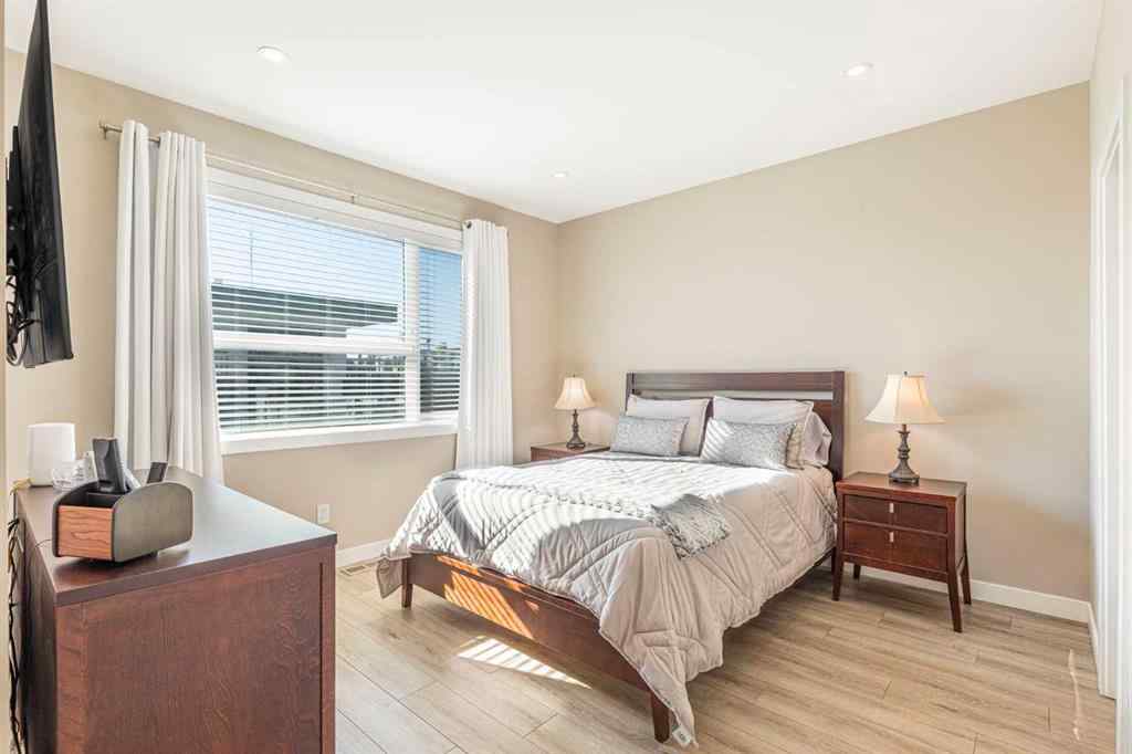 MLS® A2245881 - 846 78 Street SW in West Springs Calgary, Residential