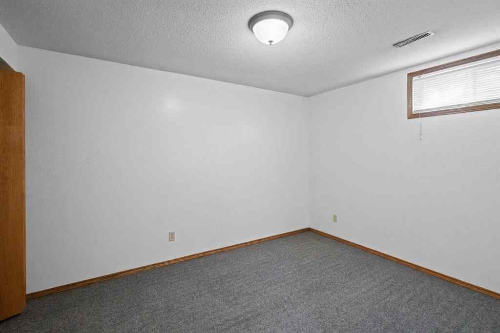 MLS® A2245908 - 5426 60 Street  in Victoria Park Camrose, Residential