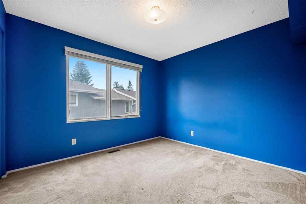 MLS® A2245925 - 409 Lake Simcoe Crescent SE in Lake Bonavista Calgary, Residential