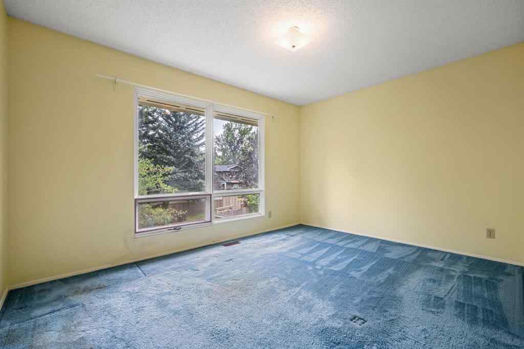 MLS® A2245925 - 409 Lake Simcoe Crescent SE in Lake Bonavista Calgary, Residential