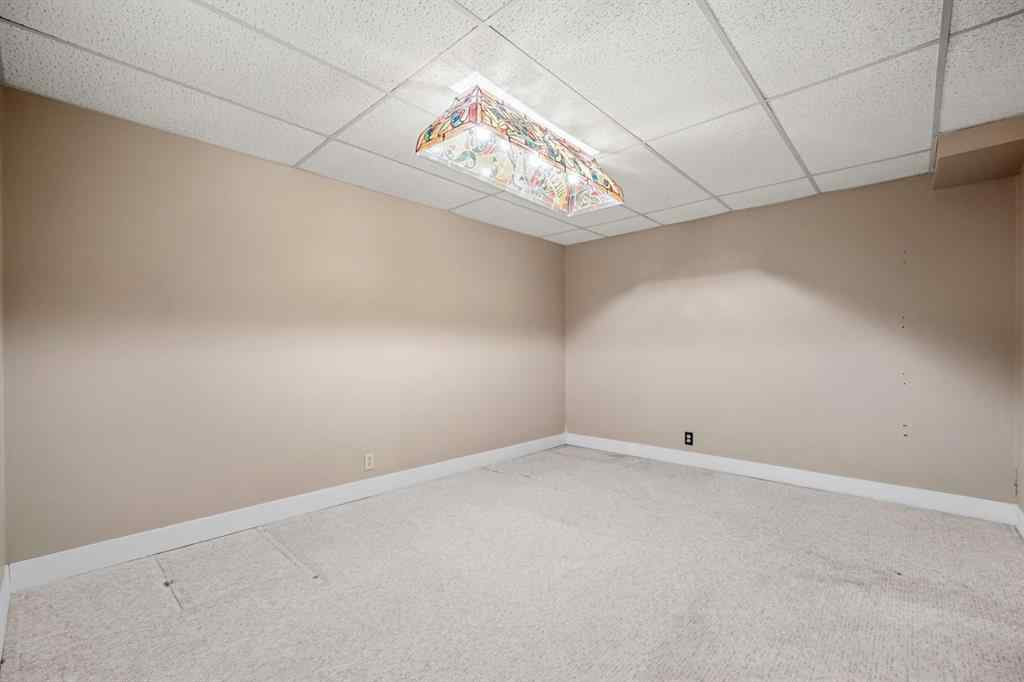MLS® A2245925 - 409 Lake Simcoe Crescent SE in Lake Bonavista Calgary, Residential