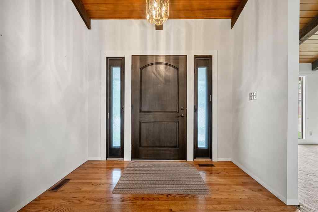 MLS® A2245925 - 409 Lake Simcoe Crescent SE in Lake Bonavista Calgary, Residential