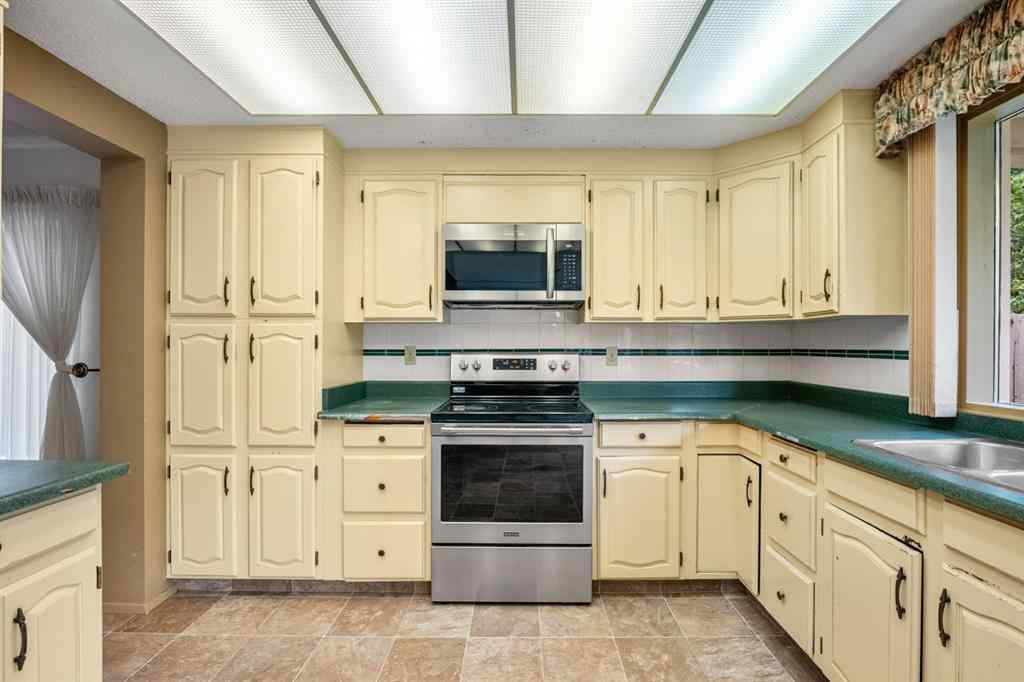 MLS® A2245925 - 409 Lake Simcoe Crescent SE in Lake Bonavista Calgary, Residential