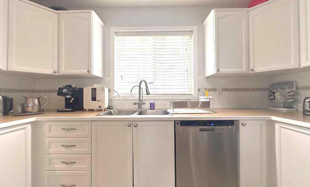 MLS® A2245960 - Unit #8 304 Ross Avenue  in Downtown Cochrane, Residential