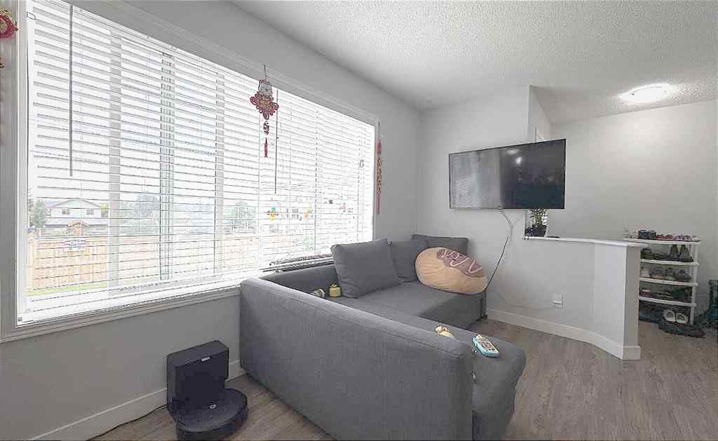 MLS® A2245960 - Unit #8 304 Ross Avenue  in Downtown Cochrane, Residential