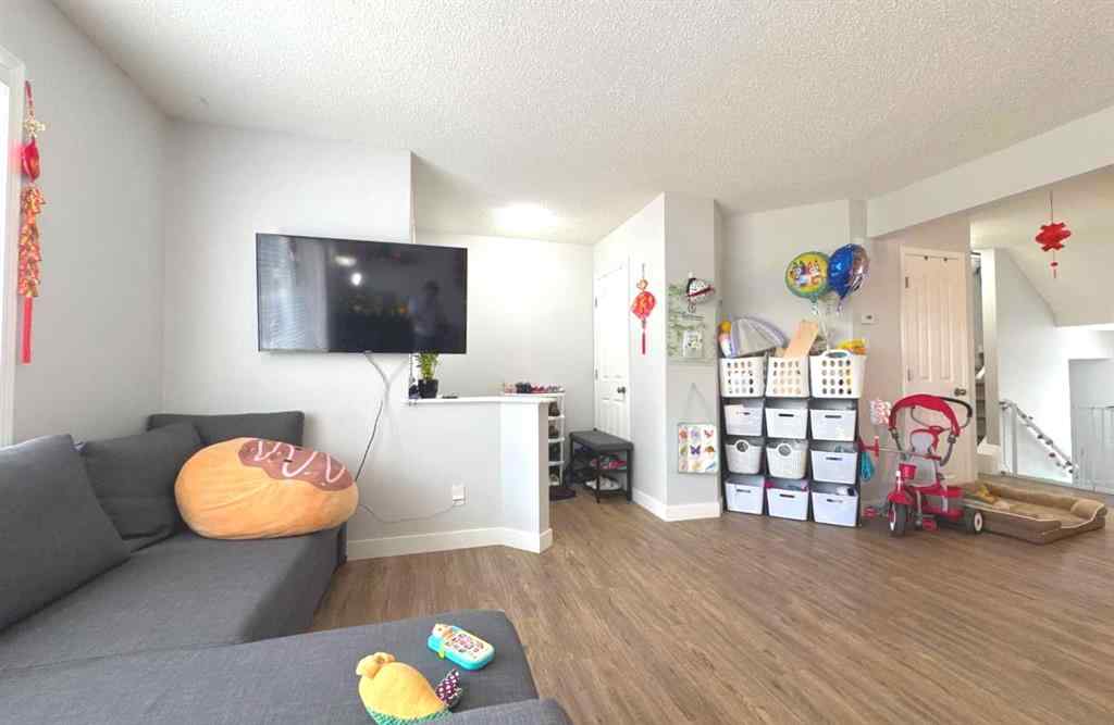 MLS® A2245960 - Unit #8 304 Ross Avenue  in Downtown Cochrane, Residential
