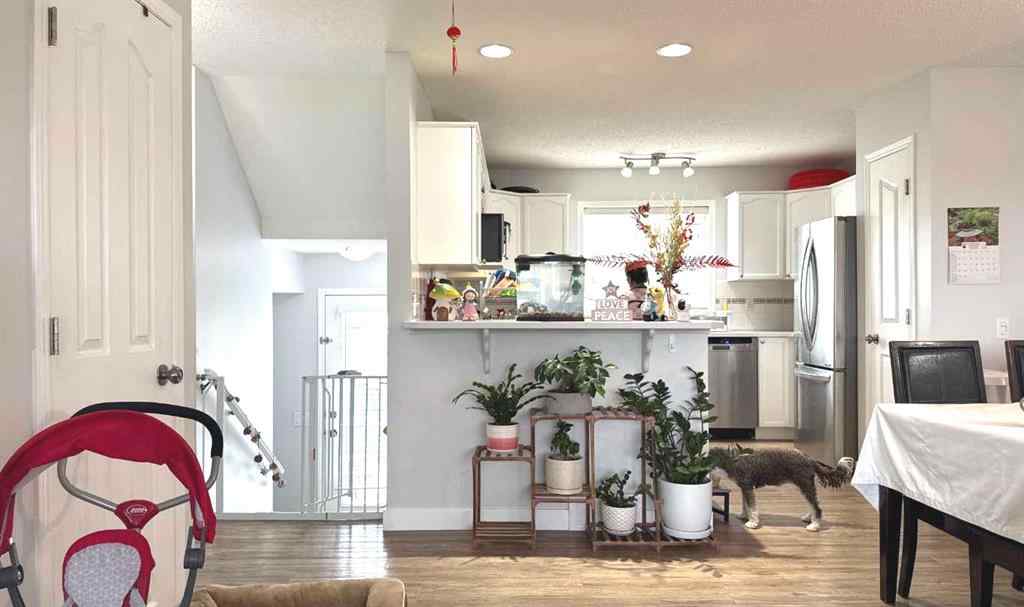 MLS® A2245960 - Unit #8 304 Ross Avenue  in Downtown Cochrane, Residential