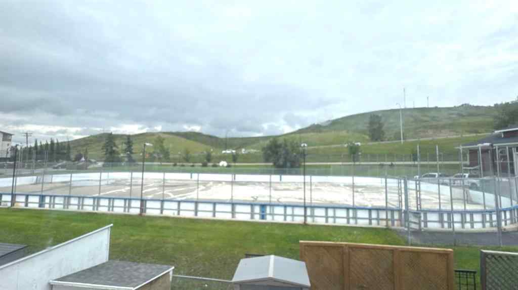 MLS® A2245960 - Unit #8 304 Ross Avenue  in Downtown Cochrane, Residential