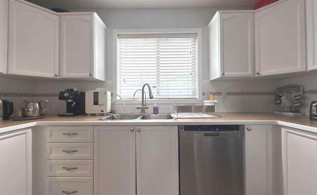 MLS® A2245960 - Unit #8 304 Ross Avenue  in Downtown Cochrane, Residential