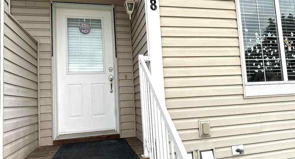 MLS® A2245960 - Unit #8 304 Ross Avenue  in Downtown Cochrane, Residential