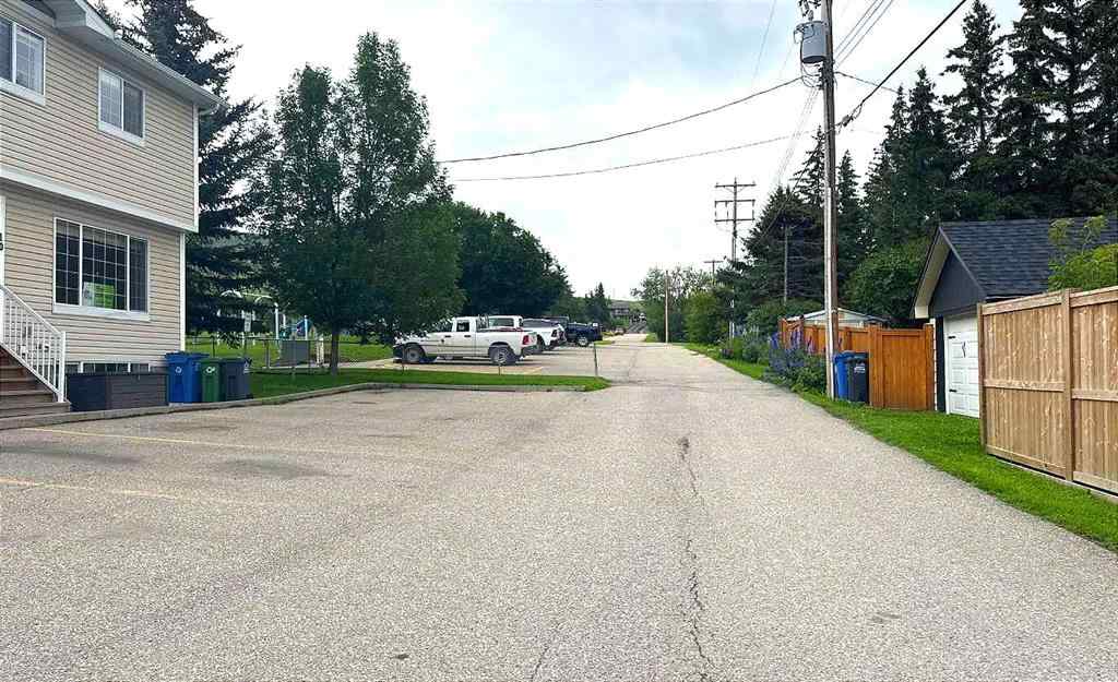 MLS® A2245960 - Unit #8 304 Ross Avenue  in Downtown Cochrane, Residential