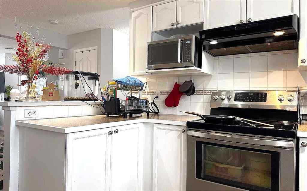MLS® A2245960 - Unit #8 304 Ross Avenue  in Downtown Cochrane, Residential