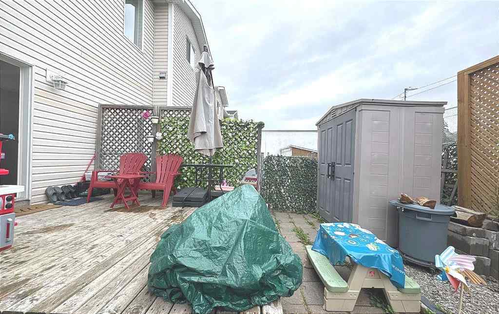 MLS® A2245960 - Unit #8 304 Ross Avenue  in Downtown Cochrane, Residential