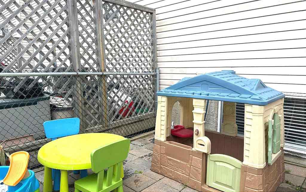 MLS® A2245960 - Unit #8 304 Ross Avenue  in Downtown Cochrane, Residential