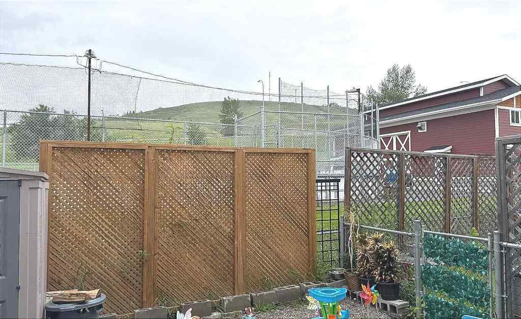 MLS® A2245960 - Unit #8 304 Ross Avenue  in Downtown Cochrane, Residential