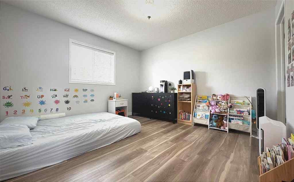 MLS® A2245960 - Unit #8 304 Ross Avenue  in Downtown Cochrane, Residential