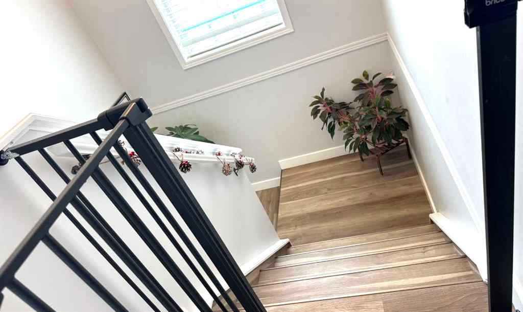 MLS® A2245960 - Unit #8 304 Ross Avenue  in Downtown Cochrane, Residential