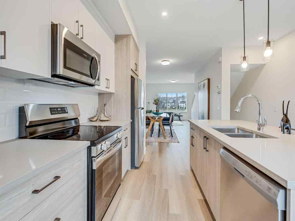 MLS® A2245970 - Unit #105 2231 81 Street SW in Springbank Hill Calgary, Residential