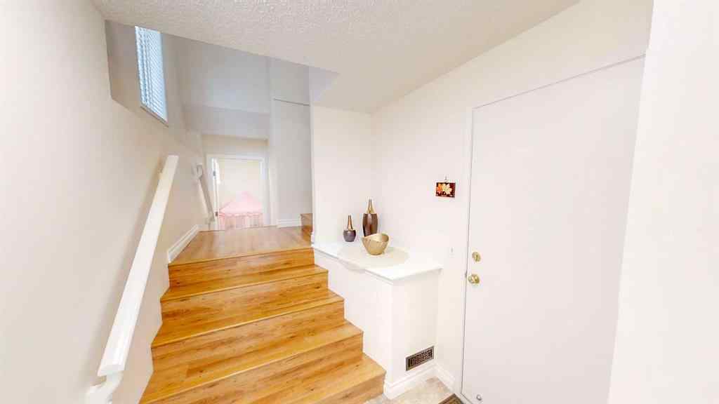 MLS® A2245992 - 305 Sierra Morena Green SW in Signal Hill Calgary, Residential