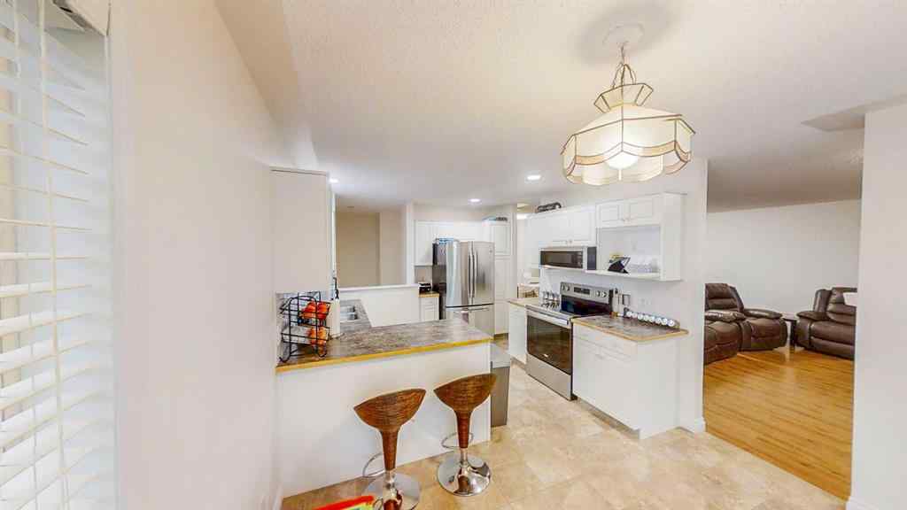 MLS® A2245992 - 305 Sierra Morena Green SW in Signal Hill Calgary, Residential