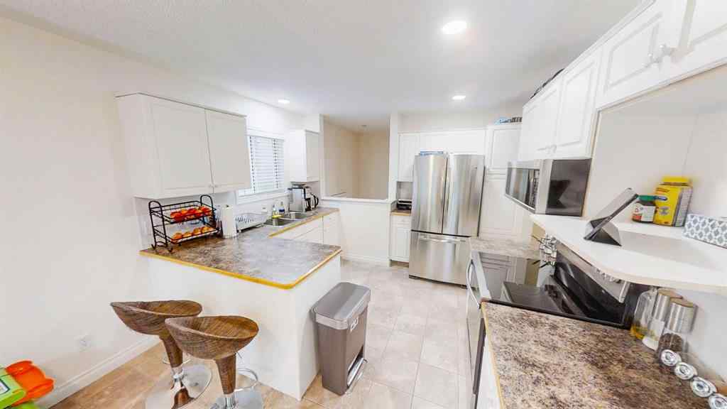 MLS® A2245992 - 305 Sierra Morena Green SW in Signal Hill Calgary, Residential