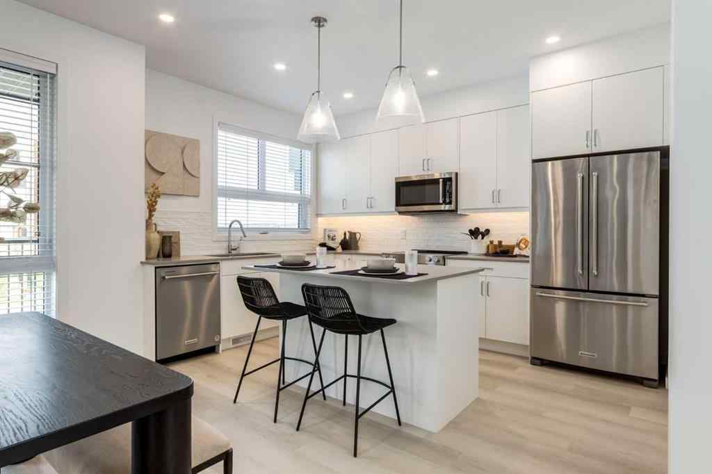 MLS® A2245993 - 1469 Na'a Drive SW in Medicine Hill Calgary, Residential