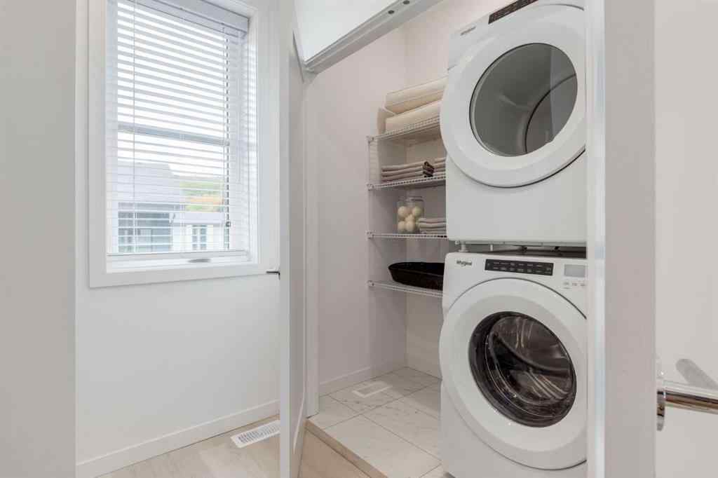 MLS® A2245993 - 1469 Na'a Drive SW in Medicine Hill Calgary, Residential