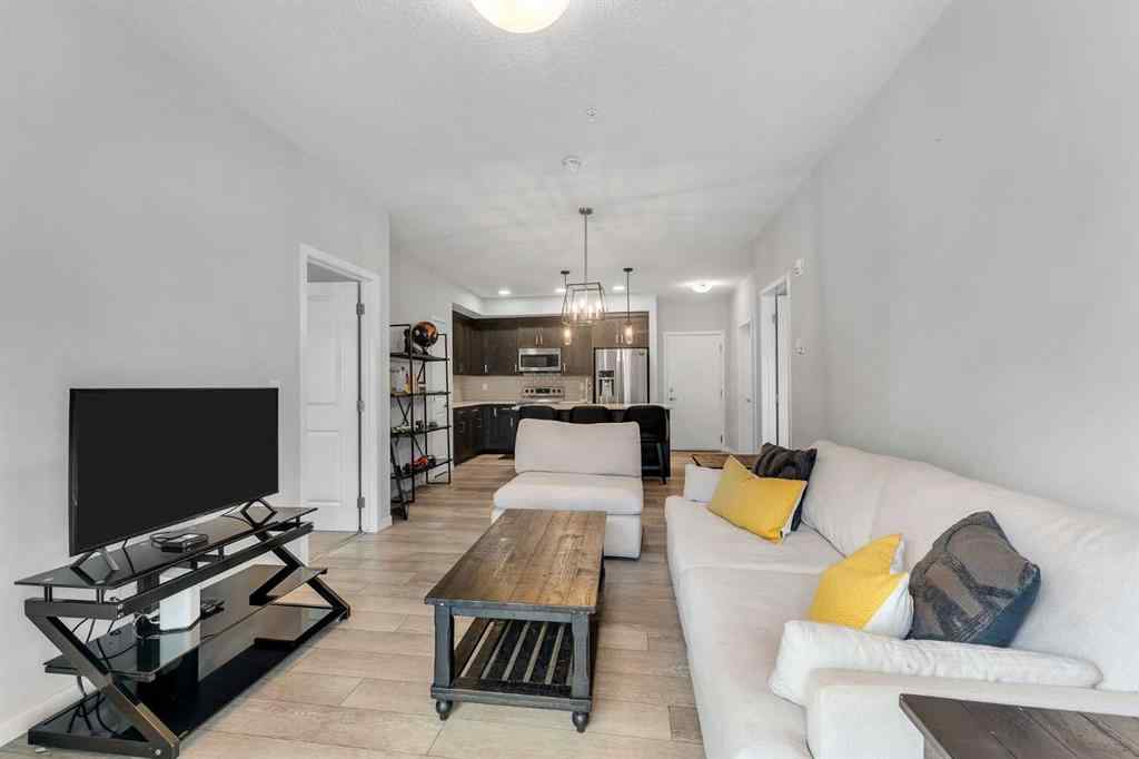 MLS® A2246006 - Unit #108 370 Harvest Hills Common NE in Harvest Hills Calgary, Residential
