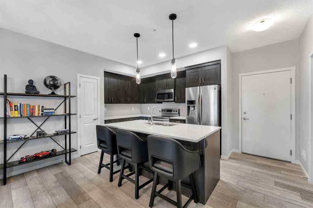 MLS® A2246006 - Unit #108 370 Harvest Hills Common NE in Harvest Hills Calgary, Residential
