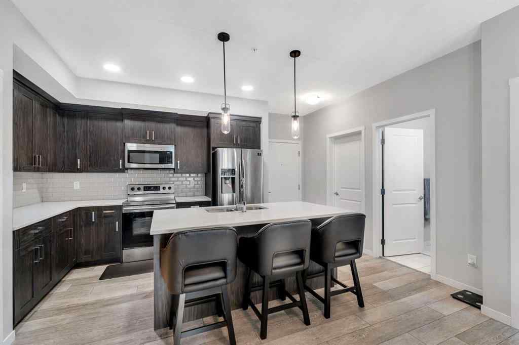 MLS® A2246006 - Unit #108 370 Harvest Hills Common NE in Harvest Hills Calgary, Residential