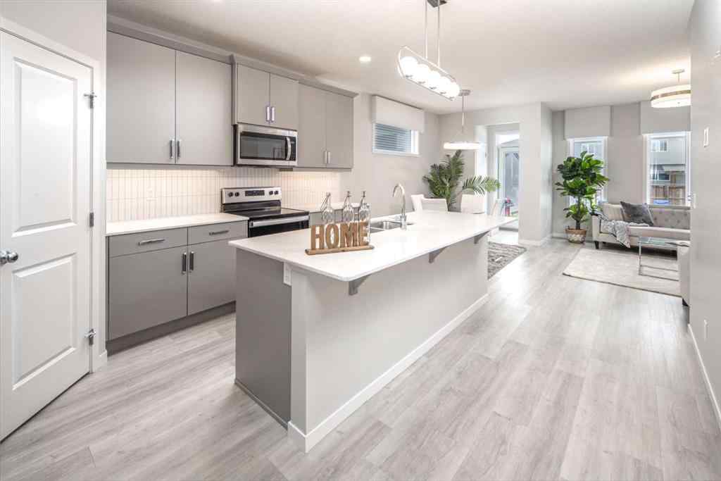 MLS® A2246013 - 23 Wolf Hollow Way SE in Wolf Willow Calgary, Residential