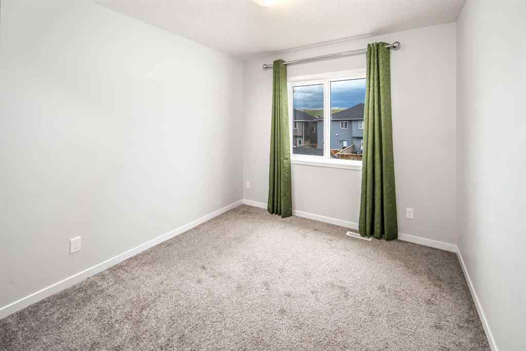 MLS® A2246013 - 23 Wolf Hollow Way SE in Wolf Willow Calgary, Residential