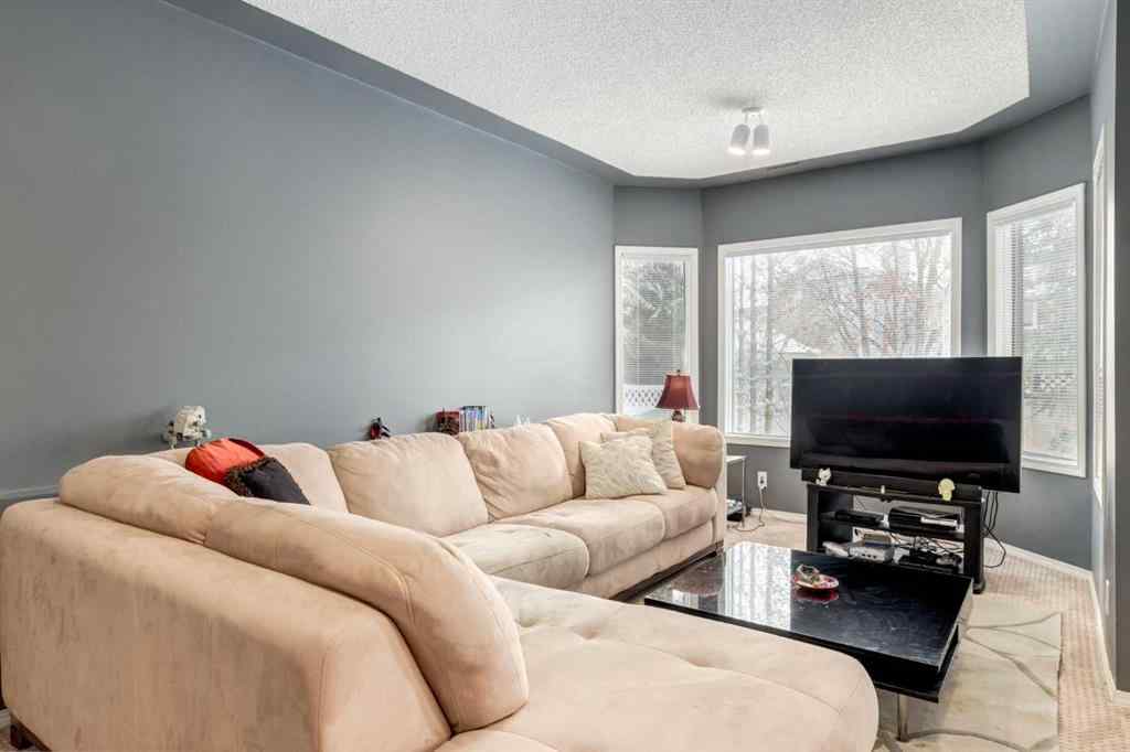 MLS® A2246020 - 82 Hawkdale Circle NW in Hawkwood Calgary, Residential