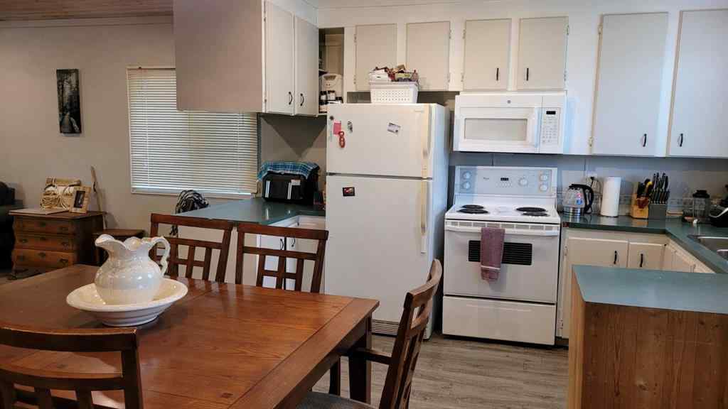 MLS® A2246043 - 5489 51 Avenue  in Downtown Lacombe Lacombe, Residential