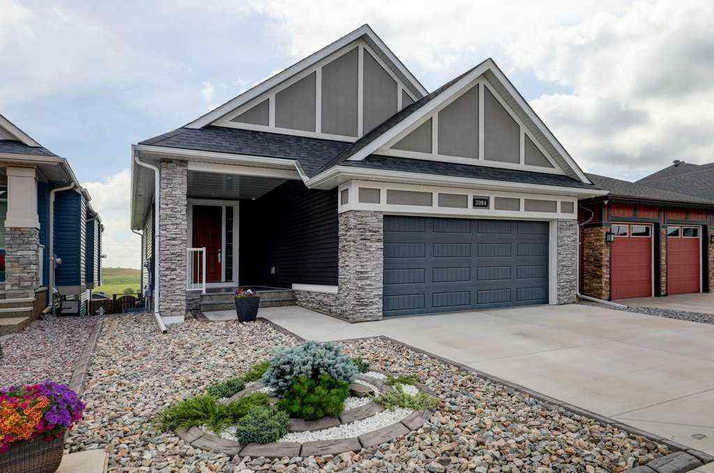 MLS® A2246078 - 2084 Ravensdun Crescent SE in Ravenswood Airdrie, Residential