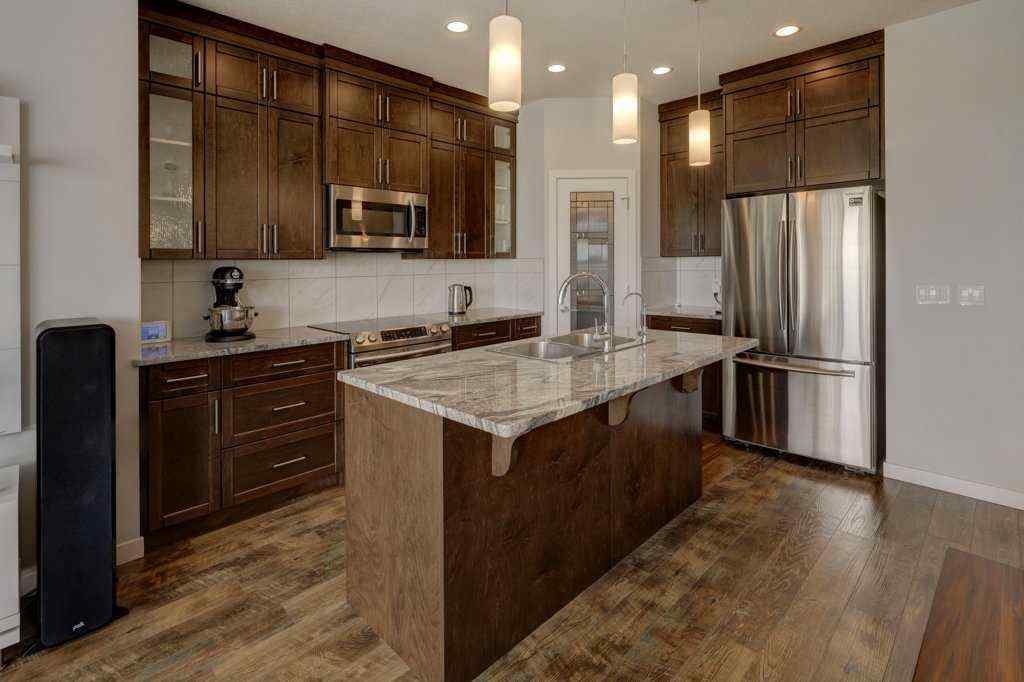 MLS® A2246078 - 2084 Ravensdun Crescent SE in Ravenswood Airdrie, Residential