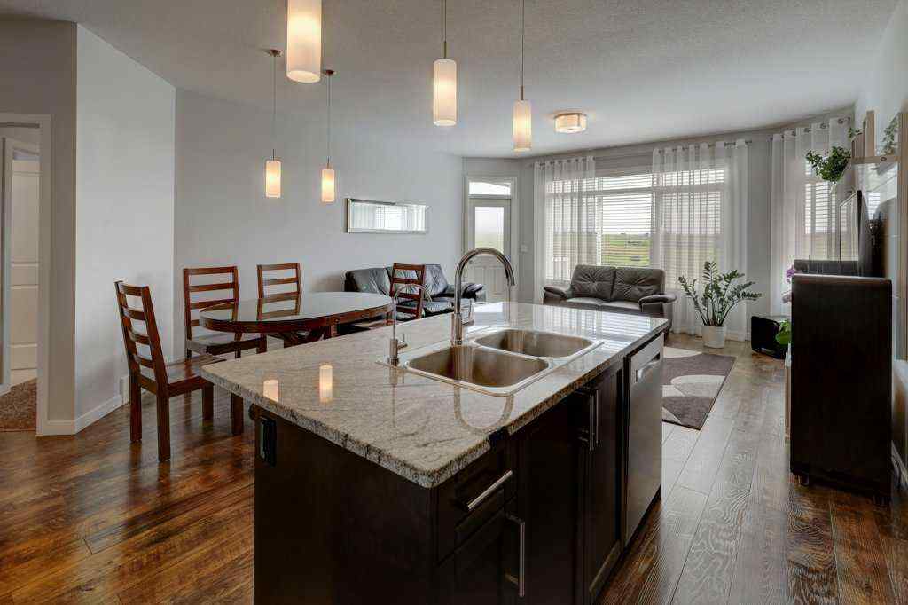 MLS® A2246078 - 2084 Ravensdun Crescent SE in Ravenswood Airdrie, Residential