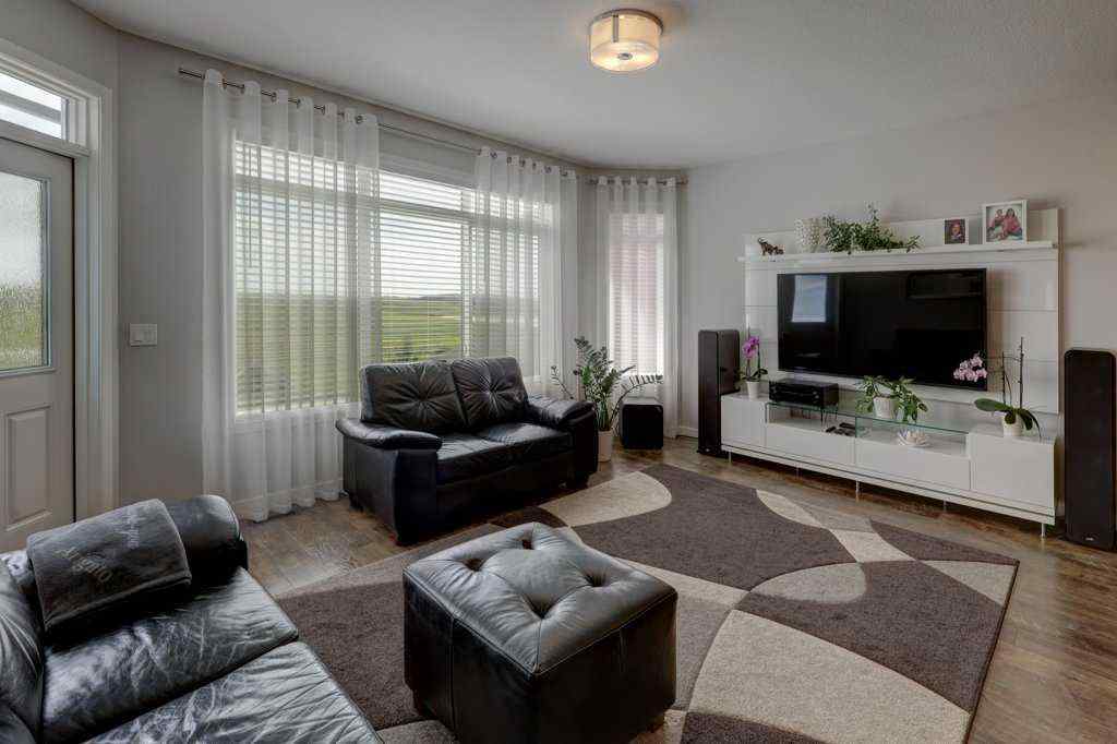 MLS® A2246078 - 2084 Ravensdun Crescent SE in Ravenswood Airdrie, Residential