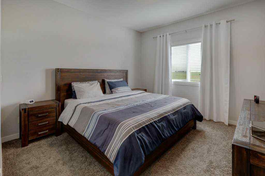 MLS® A2246078 - 2084 Ravensdun Crescent SE in Ravenswood Airdrie, Residential