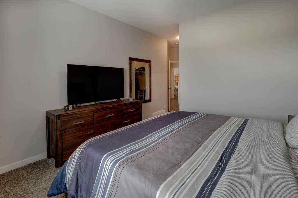 MLS® A2246078 - 2084 Ravensdun Crescent SE in Ravenswood Airdrie, Residential