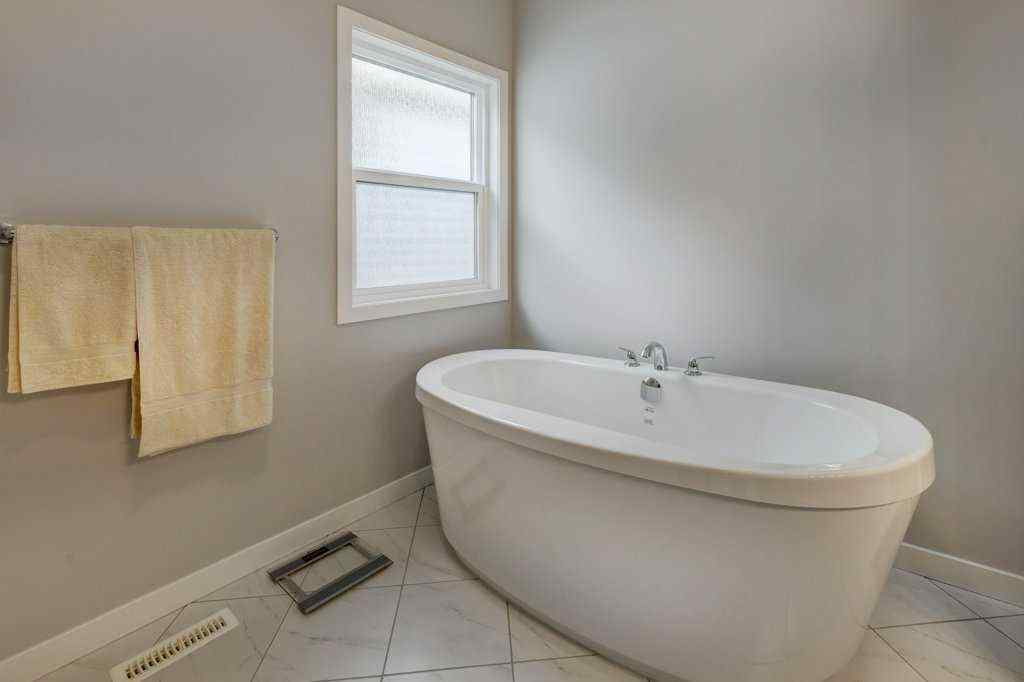 MLS® A2246078 - 2084 Ravensdun Crescent SE in Ravenswood Airdrie, Residential