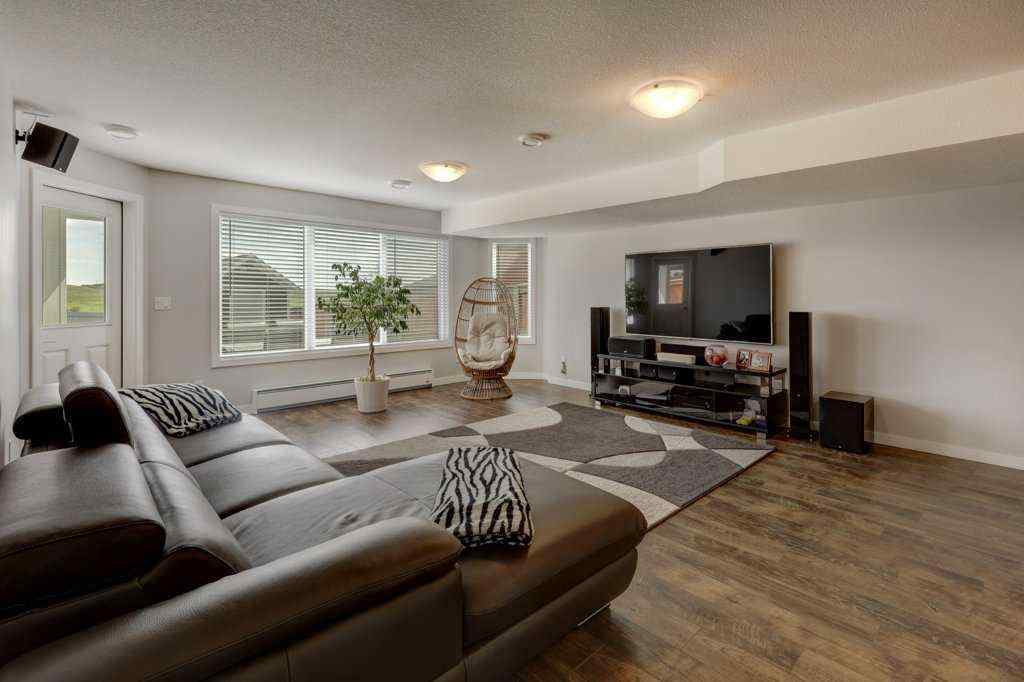 MLS® A2246078 - 2084 Ravensdun Crescent SE in Ravenswood Airdrie, Residential