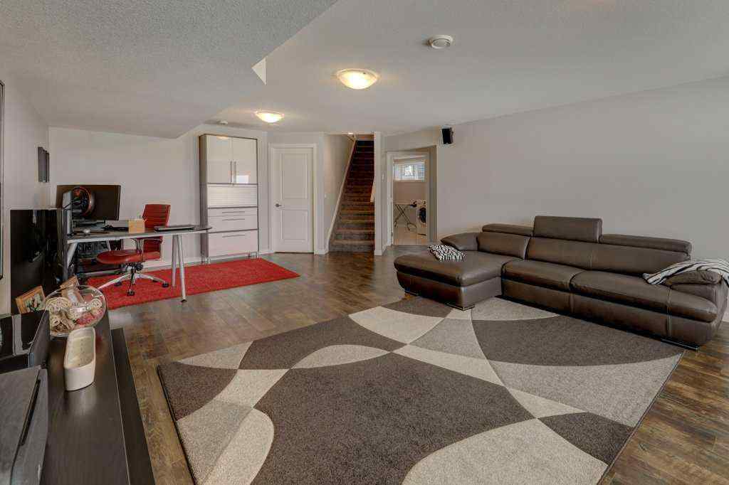 MLS® A2246078 - 2084 Ravensdun Crescent SE in Ravenswood Airdrie, Residential