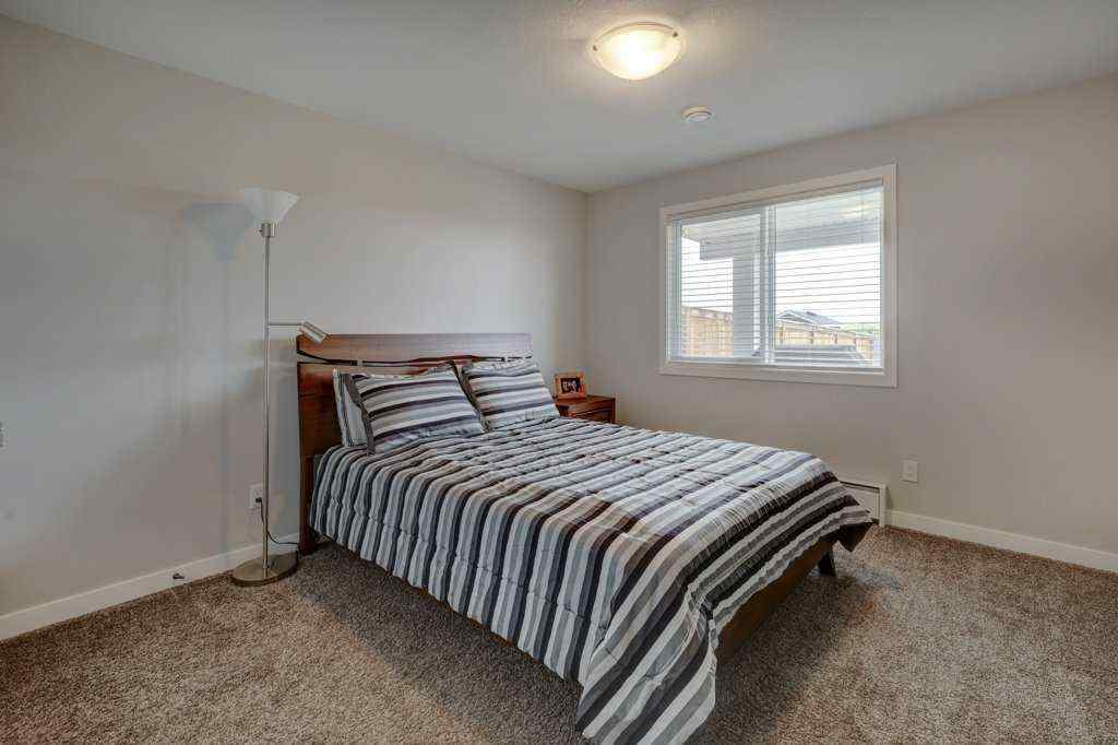 MLS® A2246078 - 2084 Ravensdun Crescent SE in Ravenswood Airdrie, Residential
