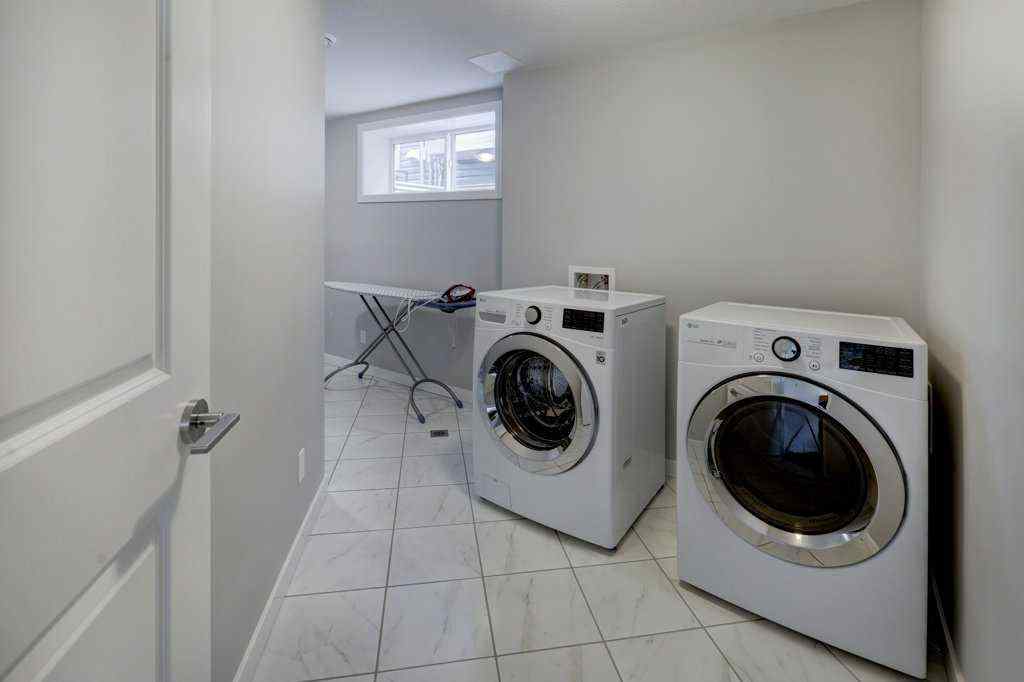 MLS® A2246078 - 2084 Ravensdun Crescent SE in Ravenswood Airdrie, Residential